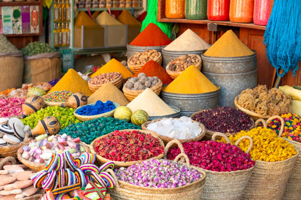 What are the key ingredients and spices used in traditional Moroccan dishes?